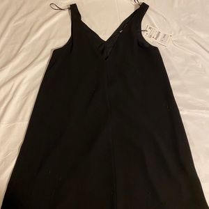 V neck, sleeveless little black dress